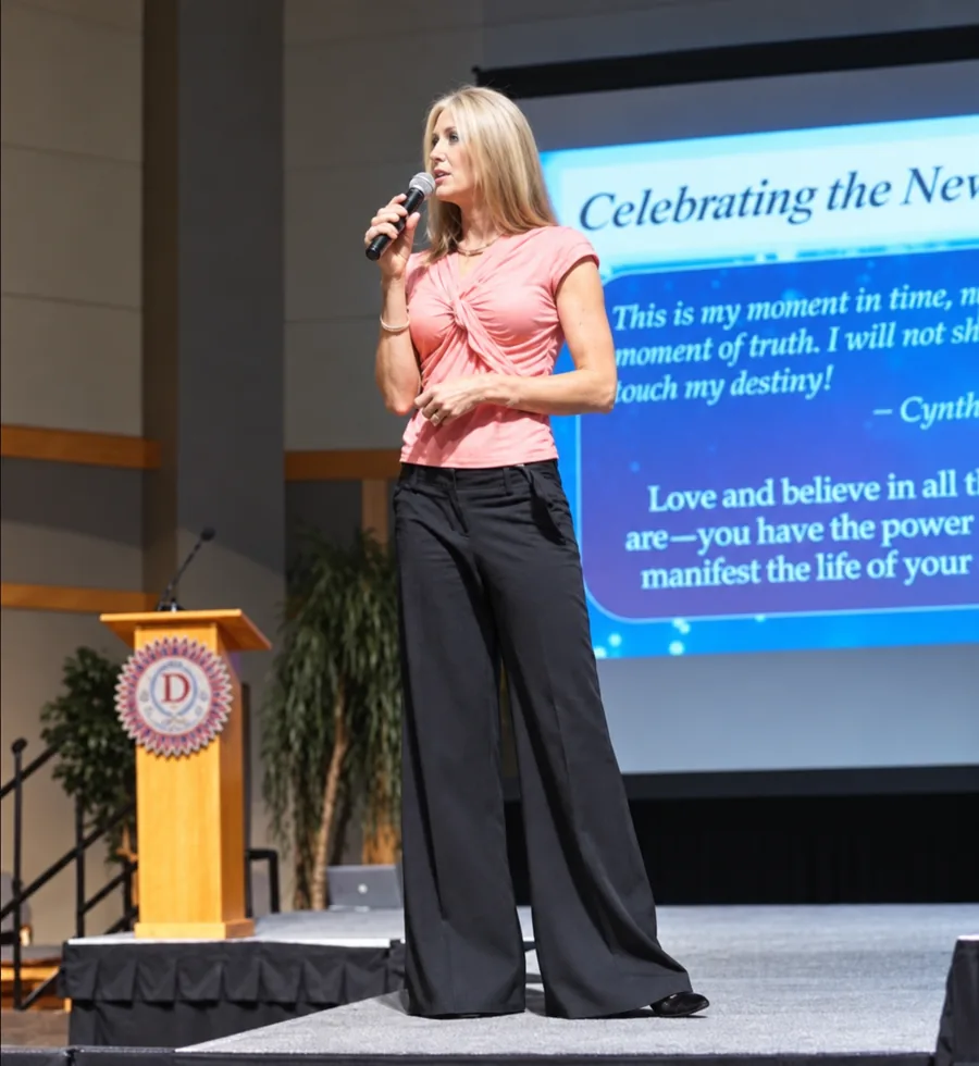 Carol Whitaker, motivational speaker, speaking on stage